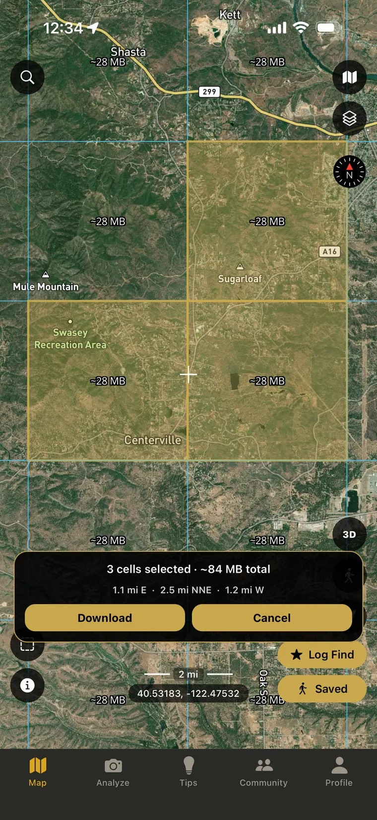 The download grid over satellite imagery with three cells highlighted, the panel showing three cells selected and about 84 MB total